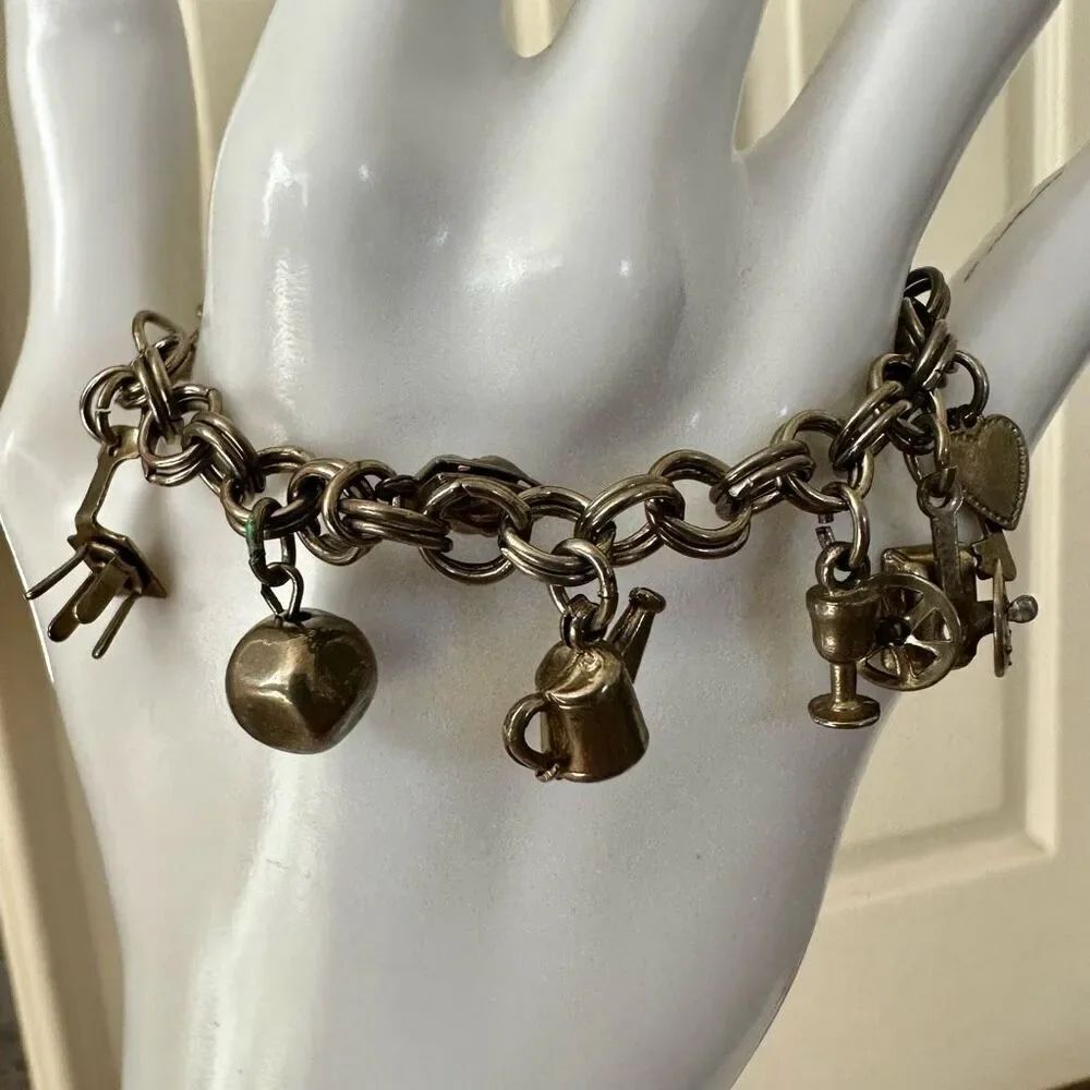 Silver tone charm bracelet